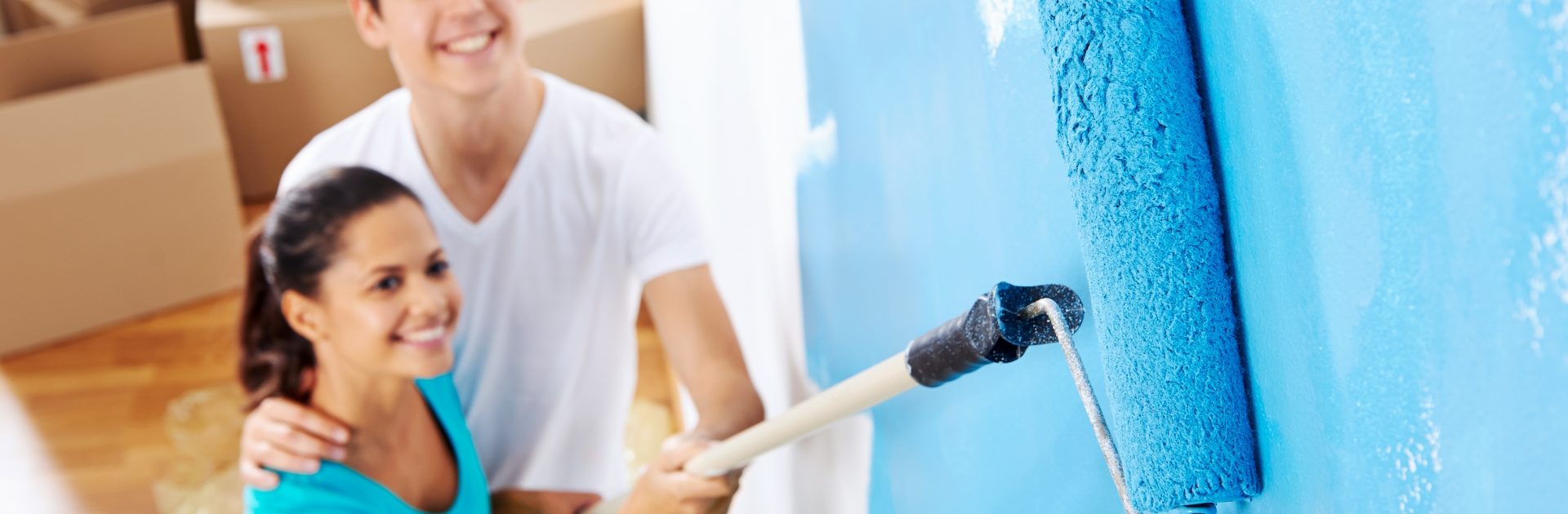 AdobeStock_53243366 - Couple Painting Home