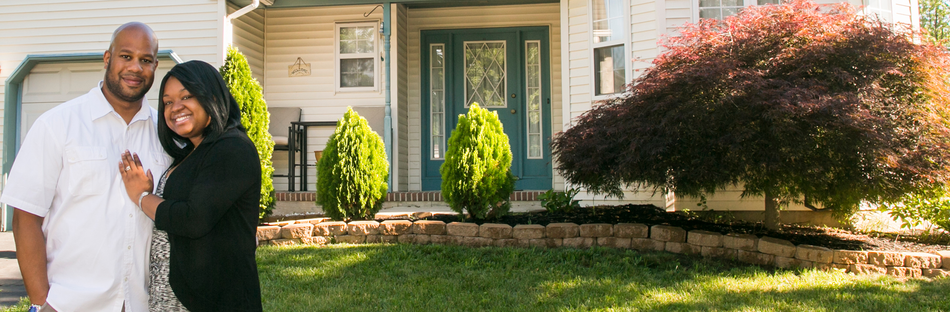 New Jersey Smart Start Homeowner Couple in front of their home